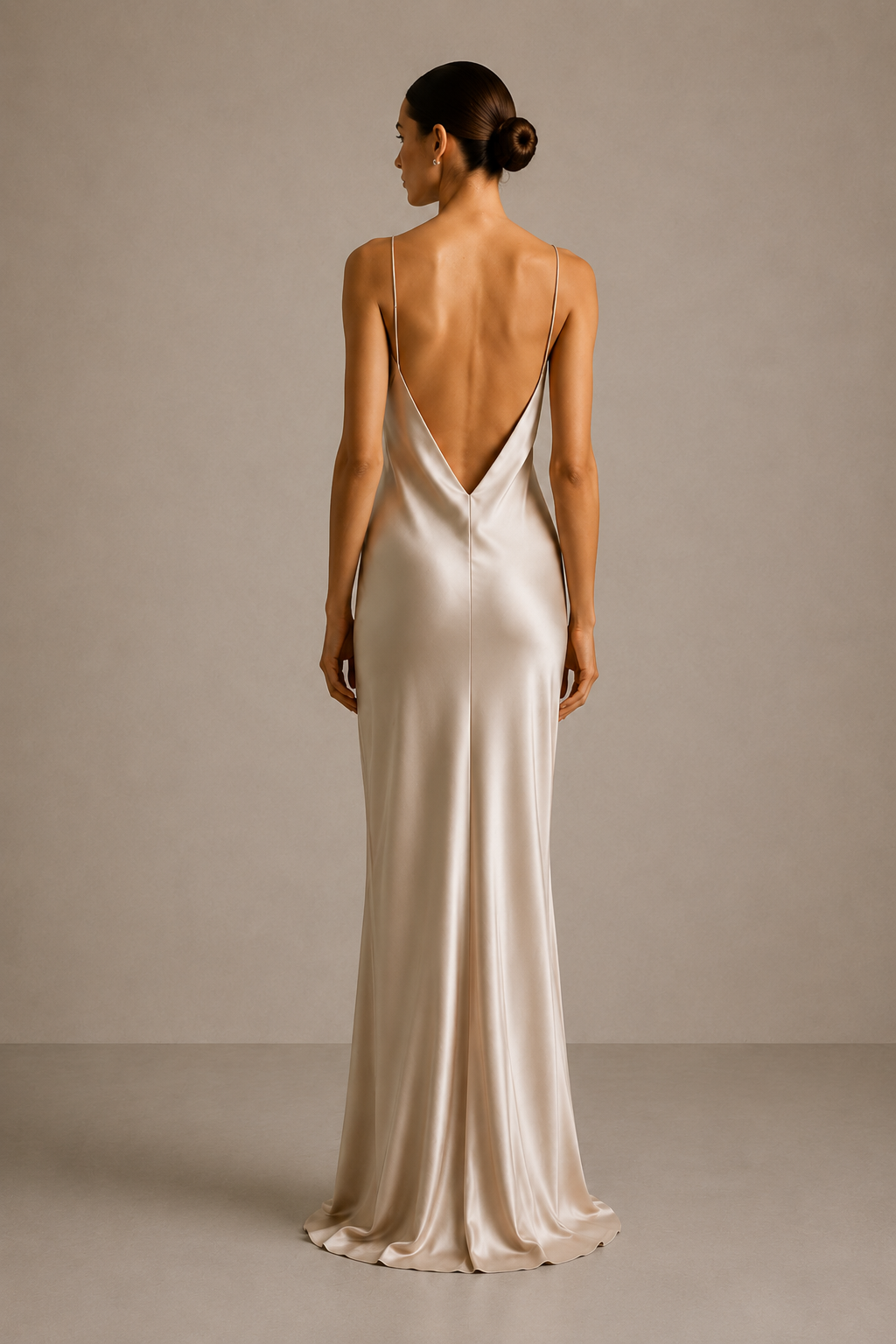 The Bias Slip Dress in Stone Beige — back view